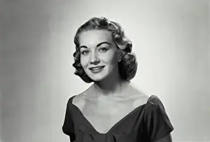 Vintage Photograph. A portrait of a young woman smiling