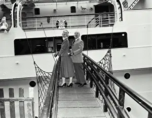 Boarding Prints: Vintage Photograph. Retired couple on gangplank of liner