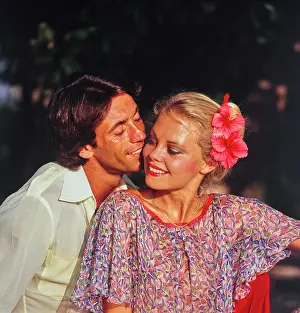 Closeness Prints: Vintage Photograph. Romantic couple enjoying a tropical getaway together