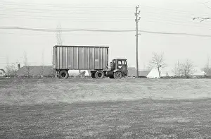 Vintage Photograph. Truck with short trailer on highway