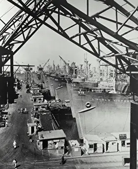Joining Prints: Vintage photograph. Victory ships at West Coast shipyard for final outfitting before joining the merchant fleet