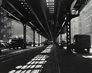 Downtown District Prints: Vintage Photograph. View under 3rd Avenue elevated at 47th St showing cars under bridge