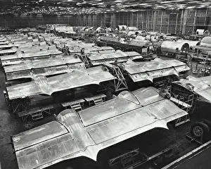 Assembly Prints: Vintage photograph. Wing line at the Boeing Aircraft Company where C-97 Stratofighters are in production