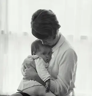 Maternal Prints: Vintage Photograph. Woman caressing child