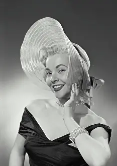 Pearls Prints: Vintage Photograph. Woman in dress wearing large hat. Frame 1