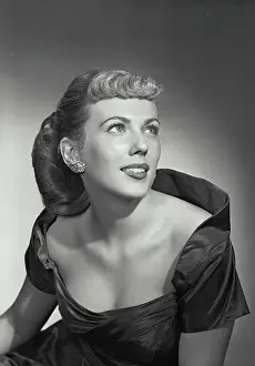 Lewis Prints: Vintage photograph. Woman in elegant dress smiling off camera