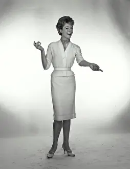 Skirt Prints: Vintage Photograph. A woman wearing a neckerchief tucked into a sweater