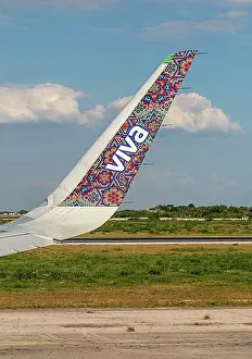 Aviation Prints: Viva Aerobus winglet livery design plane on the runway at Merida, Mexico, Central America