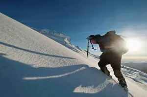 50 54 Years Prints: Walker with ice axe going through heavy snow up Beinn Respiol
