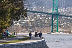 Pathway Prints: Walkers and Rollerbladers along the seawall at Stanley Park