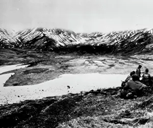 1943 Prints: This Is War As Fought On Attu -- Across this valley on Attu ***** above the fog line that obscures the tops of