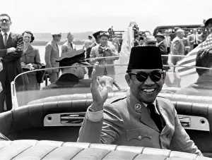 Unitedstates Prints: Washington, D.C.: May 16, 1956 President Sukarno of Indonesia waves during a motorcade on his trip to the United States