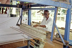 Alter Prints: weaving on Handloom, trivandrum, kerala, india Copyright: xPxKarunakaran/DinodiaxPhotox