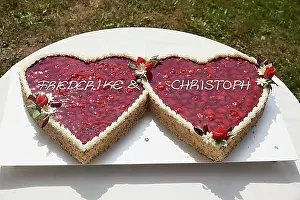Exterior Photograph Prints: Wedding cake with strawberries in the shape of two hearts