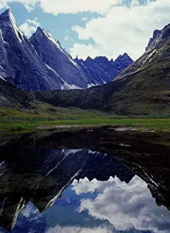 Cliffs Prints: West Maiden and Camel of the Arrigetch Peaks reflected in alpine tarn