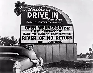 Theater Prints: Westbury, New York: 1954. Drive-in theater sign advertising River Of No Return
