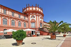 Entrances Prints: Wiesbaden, Germany, July 2021: Main entrance with restaurant of baroque palace called Schloss Biebrich
