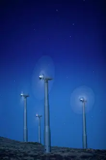 Star Prints: Wind turbines in landscape at night