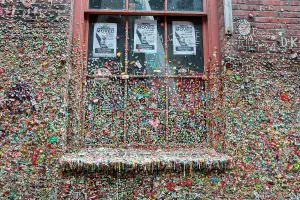 : A window at the colorful chewing gum wall in Post Alley at the Pike Place Market in Seattle