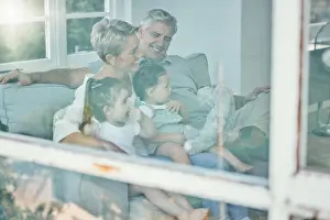 Grandparents Prints: Window, sofa and grandparents and children watching tv