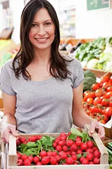 Verticals Prints: Woman with box of radish