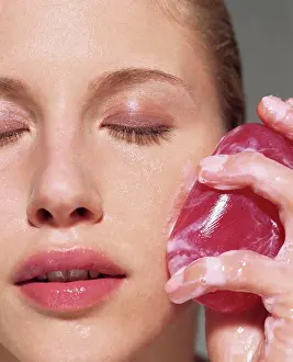 Unwind Prints: Woman cleansing her face with soap