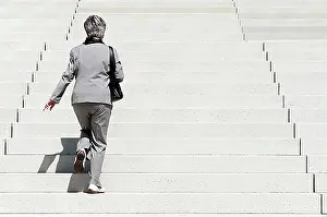 Rise Prints: Woman climbing up stairs