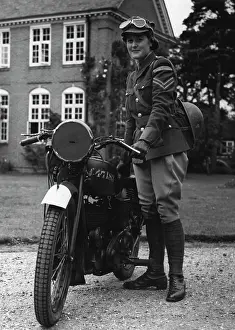 Helmet Prints: A woman dispatch ***** in England. December 4, 1941