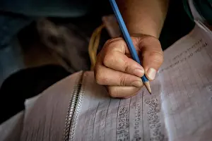 Notebook Prints: Woman does booking for a cooperative's business; Ejido Hidalgo, San Luis, Mexico