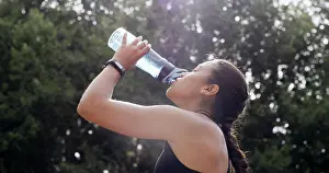 Runner Prints: Woman, drinking water and fitness in park