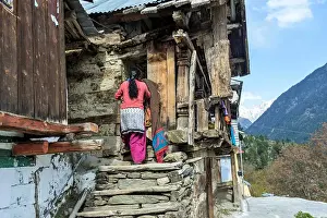 Berg Prints: Woman entering house, Mukhwa village