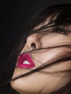 Covering Prints: Woman with hair over her face