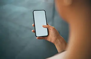 Texting Prints: Woman hands, phone and blank screen for advertising
