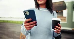 Texting Prints: Woman, hands and phone with coffee for review