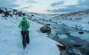 Explorations Prints: woman hiking through the frozen landscape in the west of Iceland