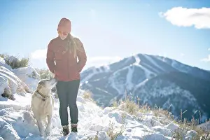 Canidae Prints: A woman and her lab on a walk on a beautiful winter morning