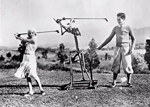 Robot Prints: Woman learning to play golf in the 1930s
