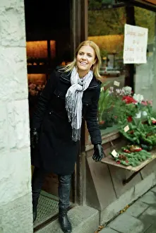 Jeans Prints: Woman looking out from a store