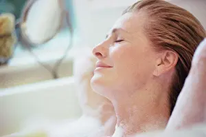 Sseditor Aa Prints: Woman lying with her eyes closed in a bubble bath
