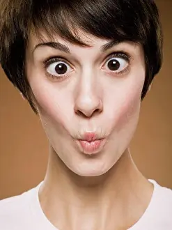 Lips Prints: Woman making funny face with eyes crossed and puckered lips