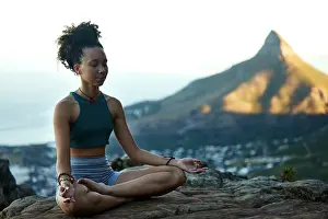 Woman, mediation and yoga on a mountain with wellness in cape town for fitness and health