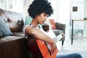Notes Prints: Woman, musician and playing on guitar strings at home for music