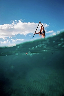 Amuse Prints: Woman paddleboarding on ocean