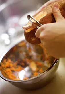 Selectivefocus Prints: Woman Peeling Sweet Potato