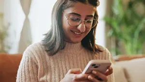 Network Prints: Woman, phone and happy with texting on sofa