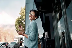 Audio Prints: Woman portrait, mobile phone and music with earphones in city for streaming service