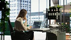 Financial Prints: Woman in a powerful executive role oversees budget analysis for investment strategy