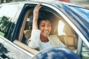 License Prints: Woman, relax and happy to drive car for license