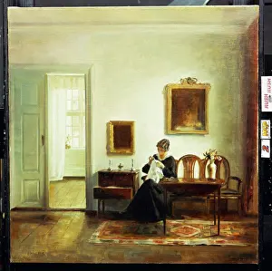 Calm Prints: A Woman Sewing in an Interior. Carl Holsoe (1863-1935). Oil on canvas, 73.3 x 71.1cm
