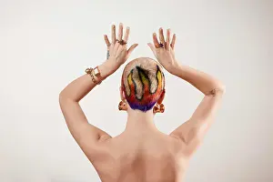 Expressive Prints: Woman with a shaved head showcases her artistic style